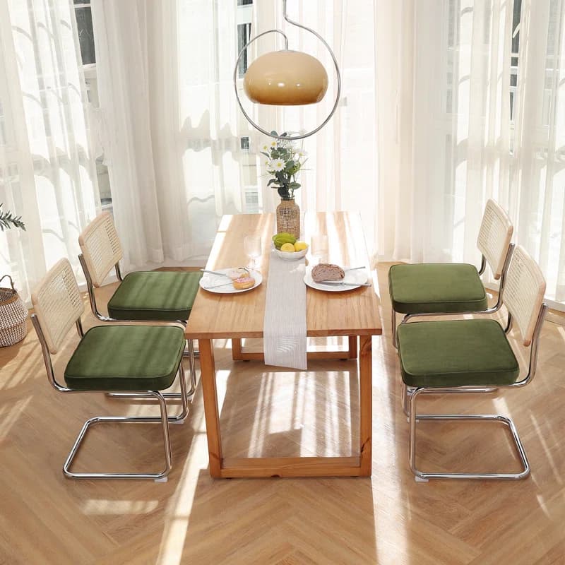 Cantilever Stainless Steel Rattan Dining Chair with Green Seat